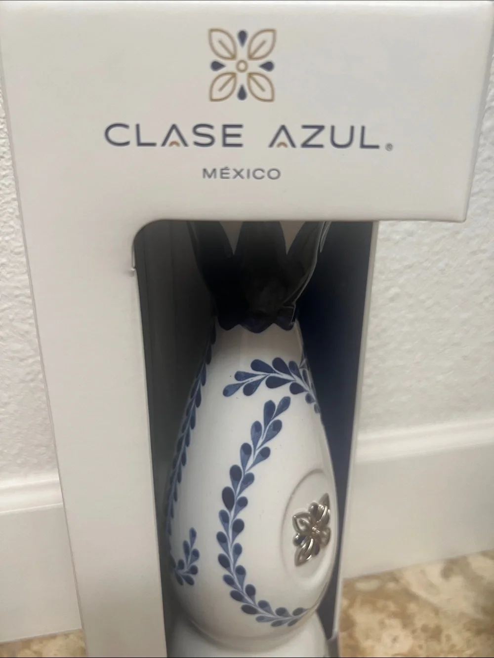 White Ceramic Accent Vase with Blue Floral Motif